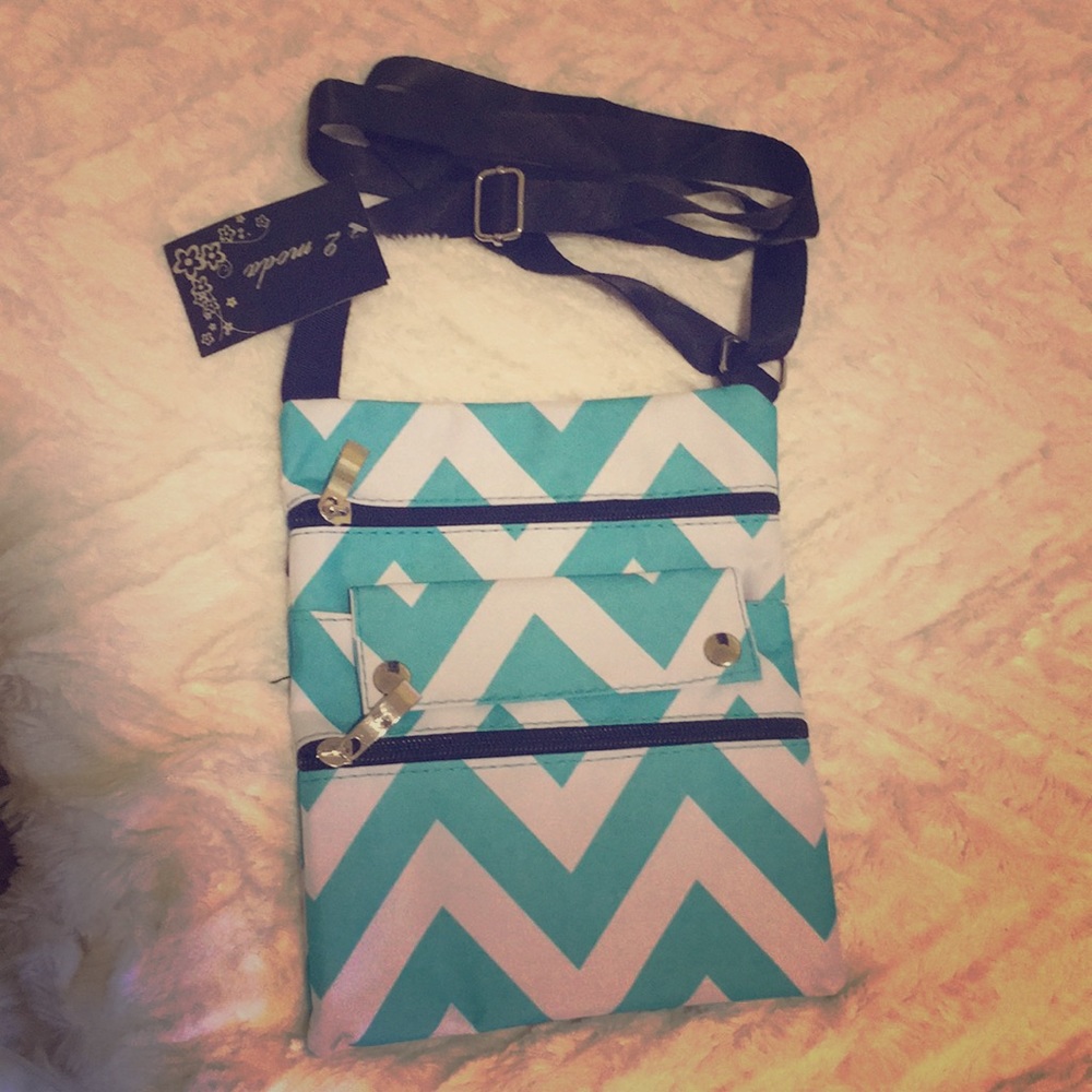 Blue and white striped shoulder bag. Never used!